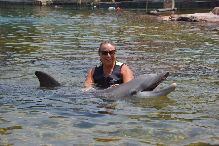 Dr.-Seena-Axel-with-Dolphin